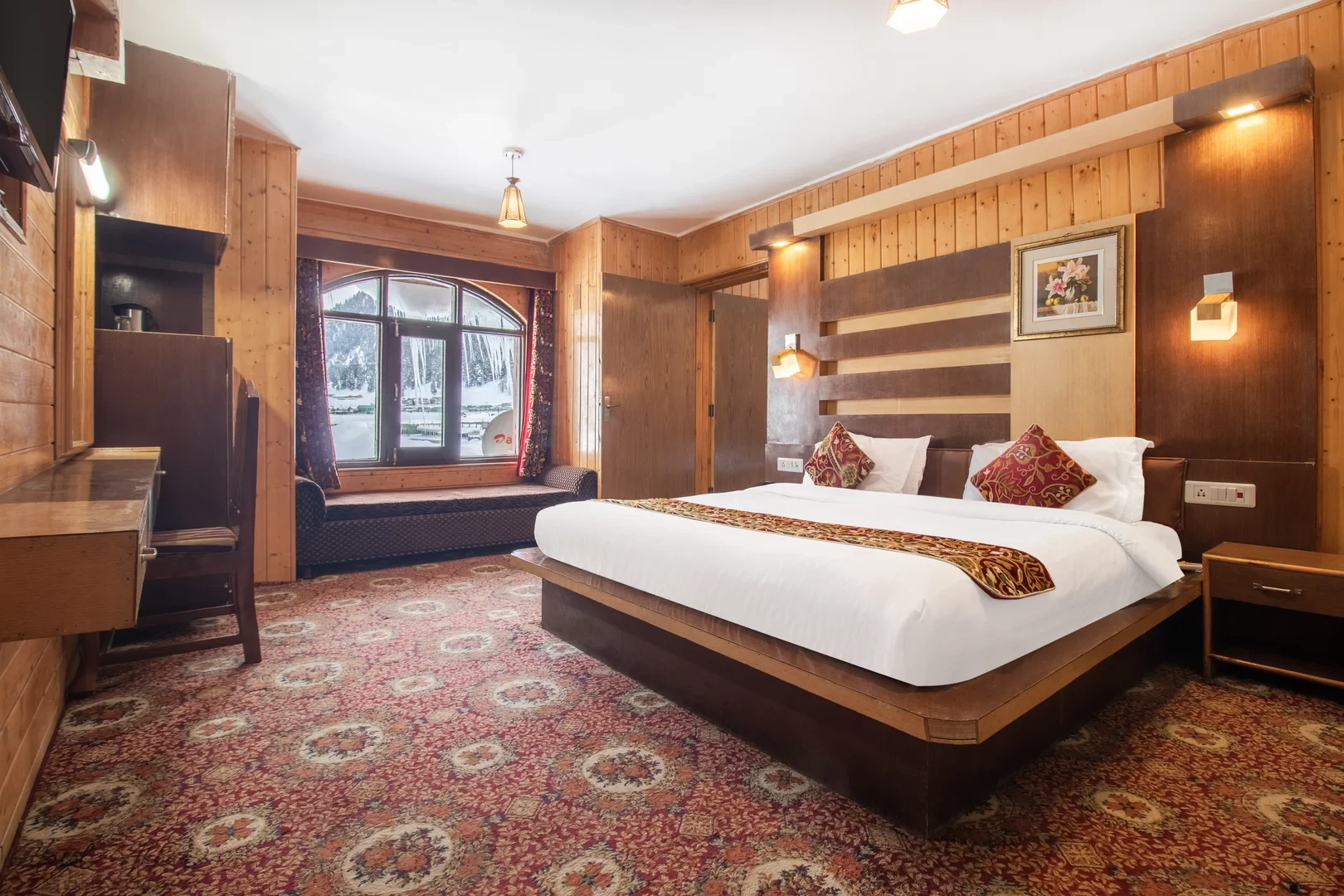 Elegant spacious hotel bedroom interior view.
